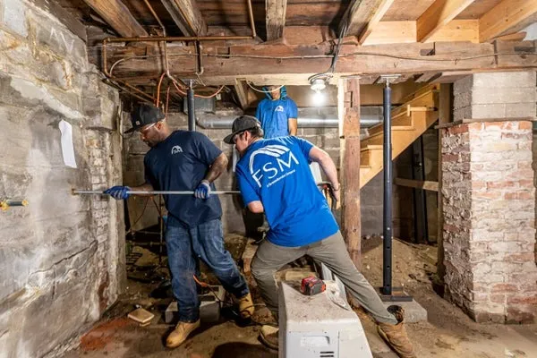 How Wall Anchors Fix Bowing Basement Walls